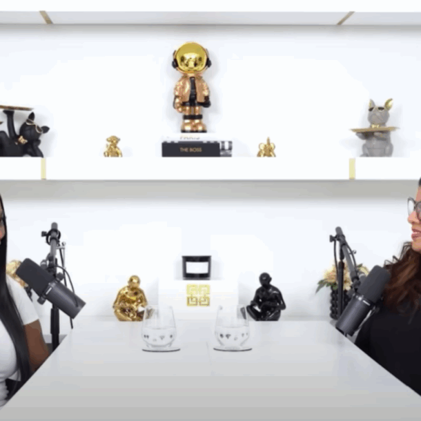 A podcast interview about AI for Entrepreneurs featuring Alicia Lyttle and Coach K, recorded in a bright studio with modern decor and professional microphones.