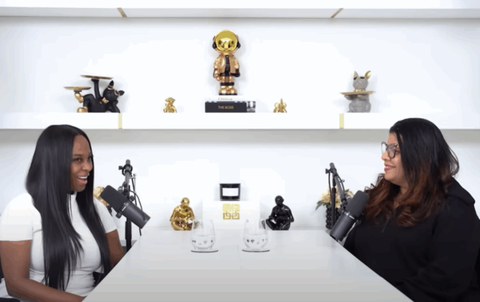 A podcast interview about AI for Entrepreneurs featuring Alicia Lyttle and Coach K, recorded in a bright studio with modern decor and professional microphones.