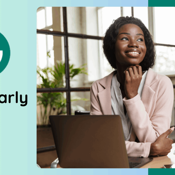 Professional woman using laptop with Grammarly AI features in a modern workspace