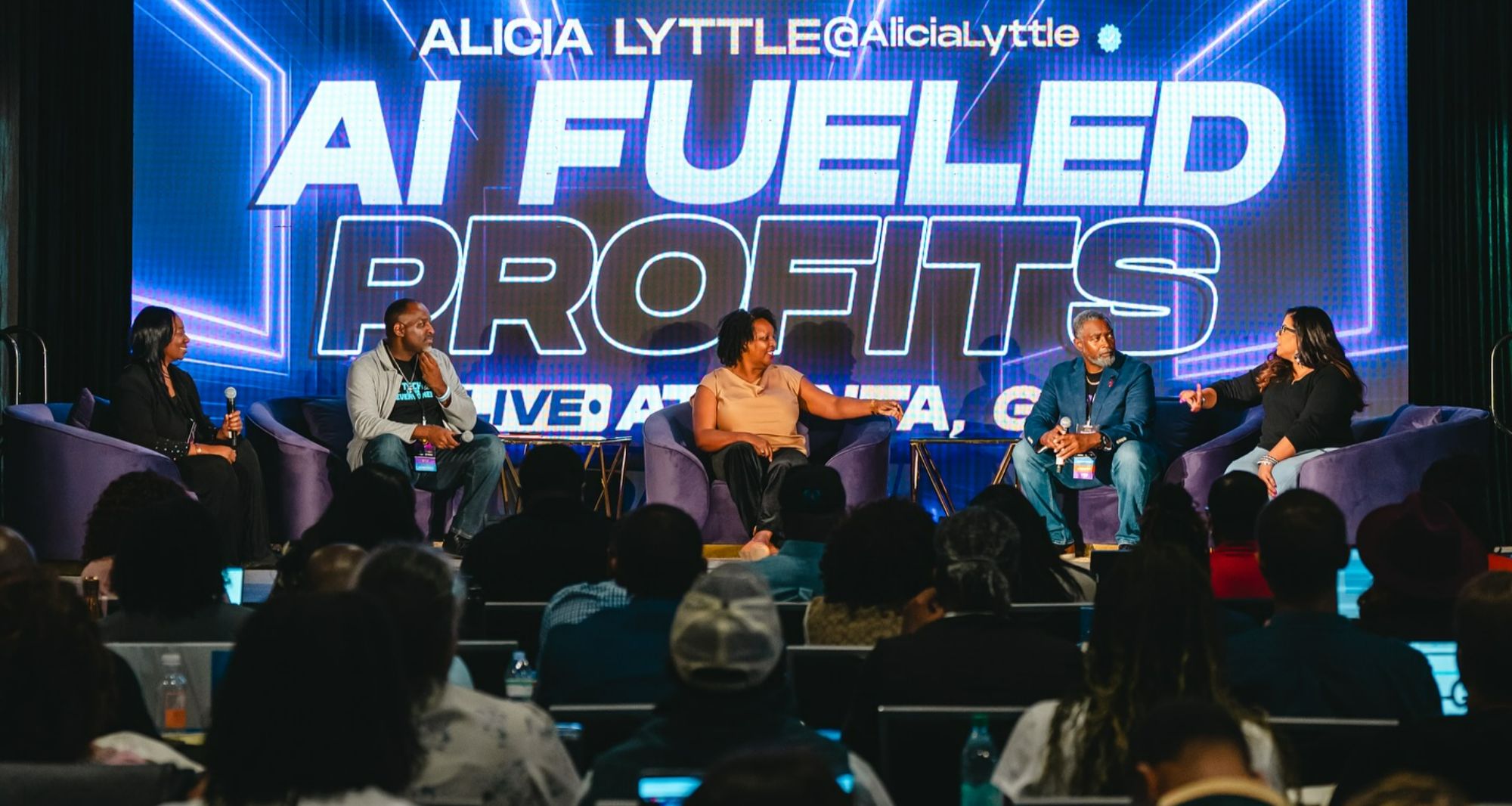 Panel of speakers and contributors at AI Fueled Profits Live in Atlanta, sharing insights and strategies with a packed audience.