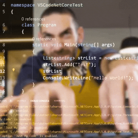 Man typing on a computer with animated code flying across the screen, representing fast-paced AI development